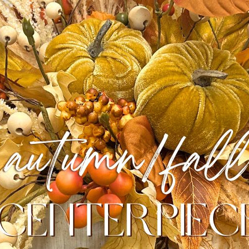 fall centerpieces with leaves, berries and pumpkins