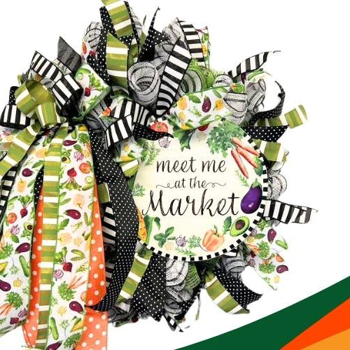 deco mesh veggie wreath with ribbon strips and a bow