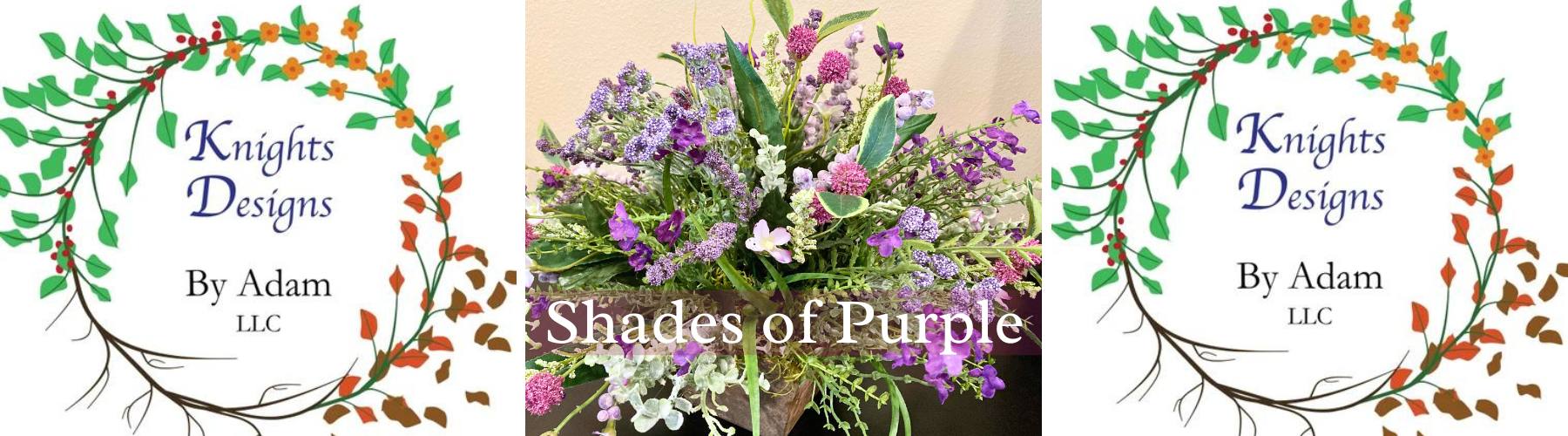 shades of purple artificial flowers in a small wooden container