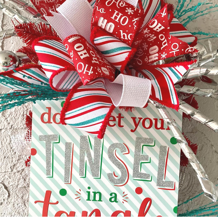 how to make a christmas swag with a tinsel tangle sign