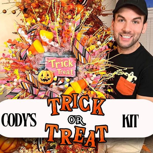 spectacular halloween wreath with trick or treat sign