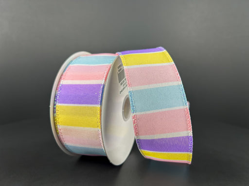 The 1.5X10Y Lavender-Yellow-Pink-Lt Blue-White Wide Stripes Ribbon 31402-09-02 is set against a plain gray backdrop.