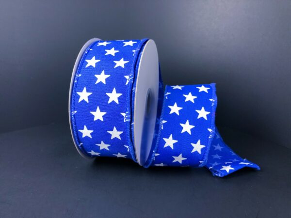 The 1.5X10Y Royal Blue Satin/White Stars Ribbon (41223-09-25) is perfect for crafting decorative bows with its blue base and white stars, making it ideal for patriotic crafts.