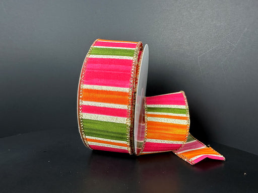 Two rolls of 1.5X10Y Fuchsia-Moss-Orange-Gold Glitter Watercolor Stripes Ribbon feature vibrant hues and a sparkling gold border, one upright and one unfurled against a dark background, adding elegance to any craft project.