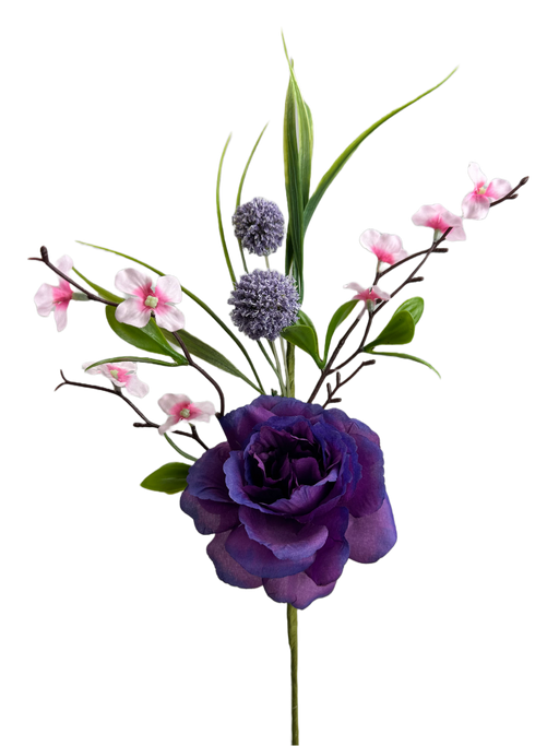 The 16 Purple Rose Pick (63543PU) features a majestic purple rose at its center, surrounded by pink and white blossoms, small purple ball-shaped flowers, and slender green leaves. Set against a dark background, it highlights vibrant beauty.