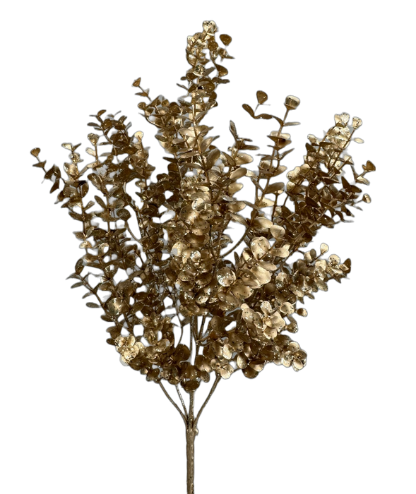 The golden eucalyptus branches, adorned with small, round leaves, form a captivating display against the black backdrop. The metallic sheen of the 20" Metallic Eucalyptus Bush with 7 Stems (85867CH) highlights its intricate structure, bringing an elegant touch to any environment.