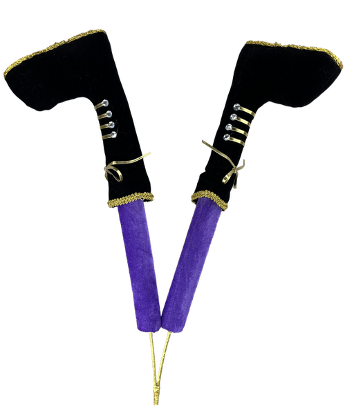 A pair of 26" high, purple and black nutcracker leg decorations featuring black witch boots with gold trim, adorned with decorative buttons and bows, designed to add an enchanting touch to your Halloween decor.