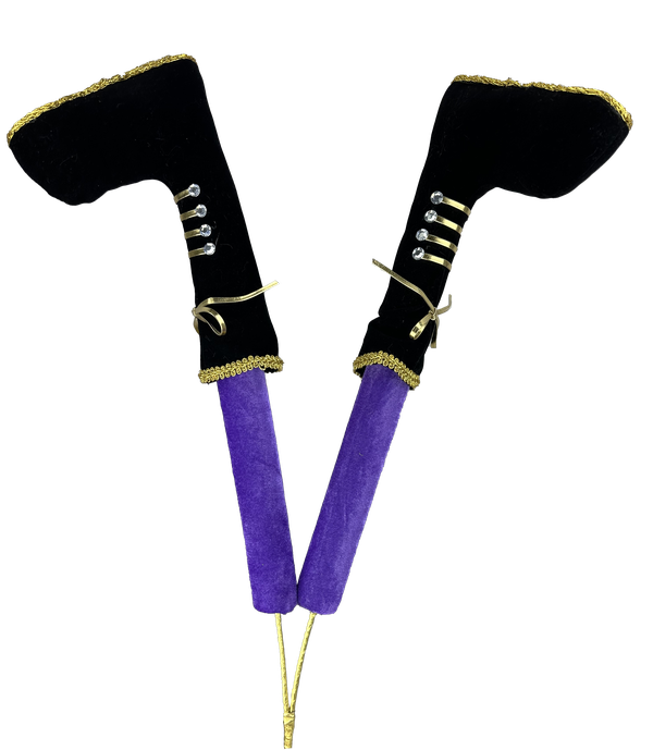 A pair of 26" high, purple and black nutcracker leg decorations featuring black witch boots with gold trim, adorned with decorative buttons and bows, designed to add an enchanting touch to your Halloween decor.