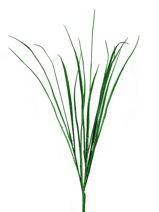 A digital artwork features the 32" Green Glitter Sword Grass Spray (product code 86010GN) with a stylized flower boasting multicolored abstract petals in shades of red, blue, and yellow. The glittering green stems, reminiscent of sword grass, extend upwards against a dark, artistic background.