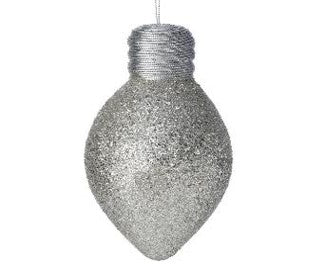 The 7" Glitter Lightbulb Ornament Platinum MTX70543 shimmers with silver glitter and hangs elegantly by its threaded top against a pristine white background.