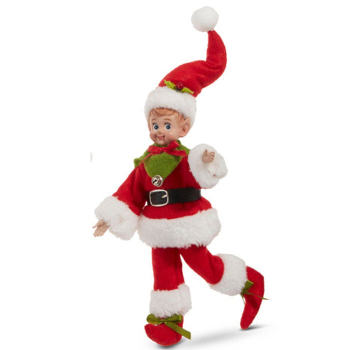 The 10" Vintage Posable Elf 4302469 is adorned in a red and white Santa outfit, complete with a green scarf, shoes, and topped with a red Santa hat featuring a pom-pom. Ideal for decorative use only, this charming elf captures the spirit of Christmas 2023 through its animated pose.