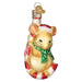 The Christmas Mouse Ornament from Old World Christmas, model number 12637, showcases an adorable mouse dressed as Santa's helper. With a whimsical red Santa hat and a green scarf decorated with white polka dots, the mouse sits endearingly on top of a red and white striped candy cane, perfect for enhancing your holiday festivities.