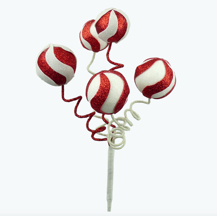 A decorative display featuring the 16” Red White Swirl Peppermint Ball Christmas Pick 84780RDWT, showcasing five red and white glittery peppermint ball ornaments on curly stems, reminiscent of festive Styrofoam decorations, set against a simple background.