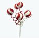 A decorative display featuring the 16” Red White Swirl Peppermint Ball Christmas Pick 84780RDWT, showcasing five red and white glittery peppermint ball ornaments on curly stems, reminiscent of festive Styrofoam decorations, set against a simple background.