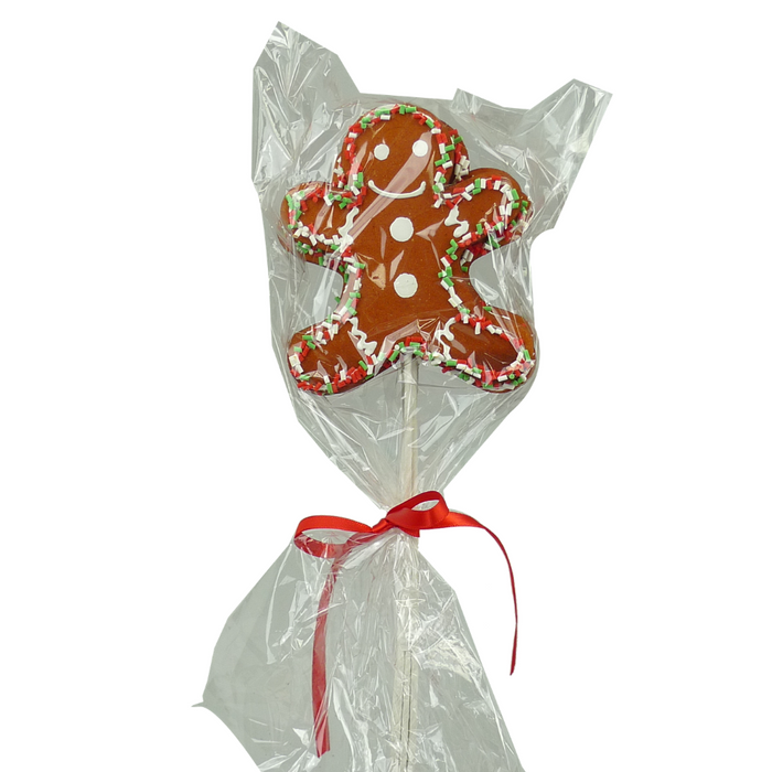 Product 84807Rwg features a gingerbread man cookie on a stick, decorated with white icing and festive red, white, and green sprinkles. It is wrapped in clear plastic and tied with a red ribbon. The item measures 12" by 3.5.