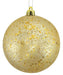 A 100Mm Mist Ball Ornament in Gold, adorned with shimmering gold glitter and a gleaming gold cap, hangs by a string against a plain background. (Product Code: XY805508)