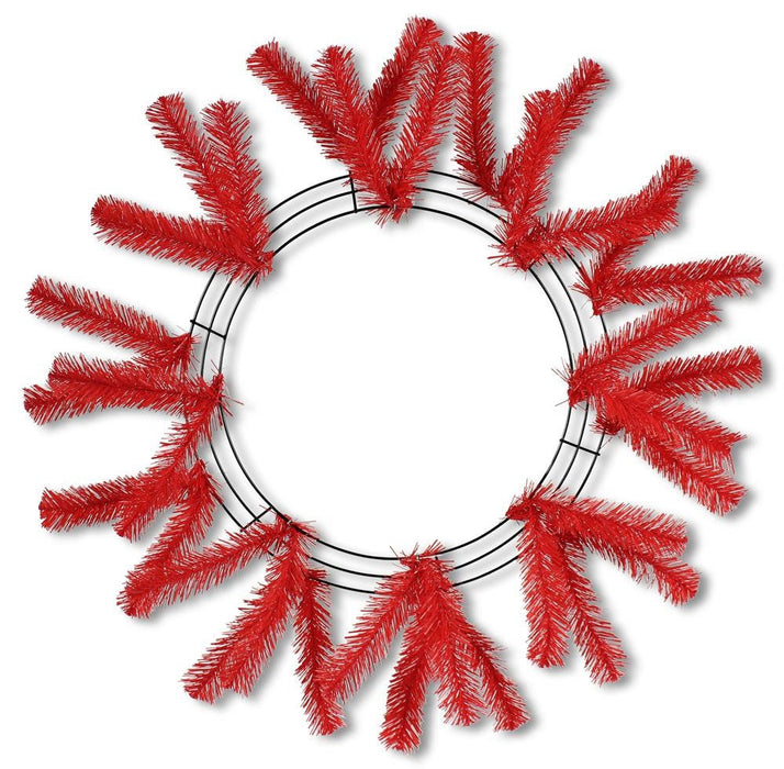 The 24" Red Work Wreath XX748824 is a festive home decor gem, featuring a circular metal frame beautifully adorned with vibrant red tinsel branches. Ideal for DIY craft projects, its striking appearance brings a touch of holiday cheer to any space.