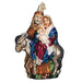 The Joseph Mary Baby Jesus Flight to Egypt Old World Christmas Ornament 10209 beautifully captures a vibrant family scene, featuring a man and donkey accompanying a woman and child. The figures, adorned in traditional robes, are artfully depicted, infusing any festive decor with timeless charm.