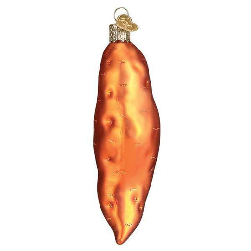 The Sweet Potato 28126 Old World Christmas Ornament, made from mouth-blown glass, features a glossy orange finish with subtle indentations. Its hand-painted details and gold loop offer a delightful touch to any holiday tree.