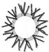 The 24 Pencil Work Wreath Metallic Black XX751102 features sparse, spiky branches in a circular design on three concentric metal rings, offering a minimalist starburst look against a white background.